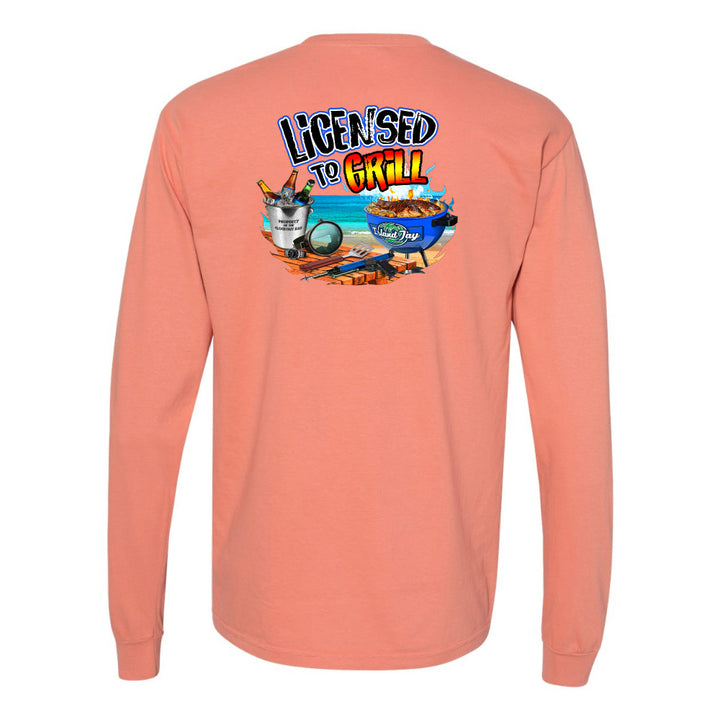 Peach long-sleeve shirt with 'Licensed to Grill' graphic on a white background