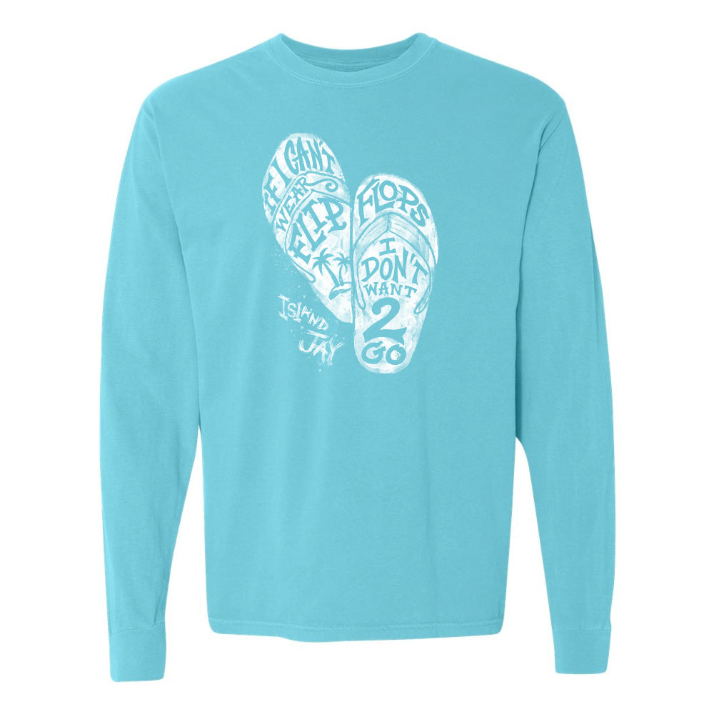 Light blue long-sleeve shirt with white graphic design on a white background