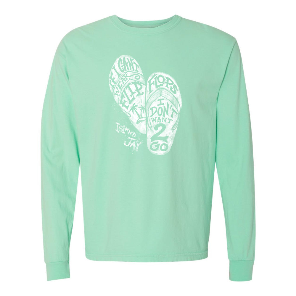 Mint green long-sleeve shirt with white graphic design on a white background