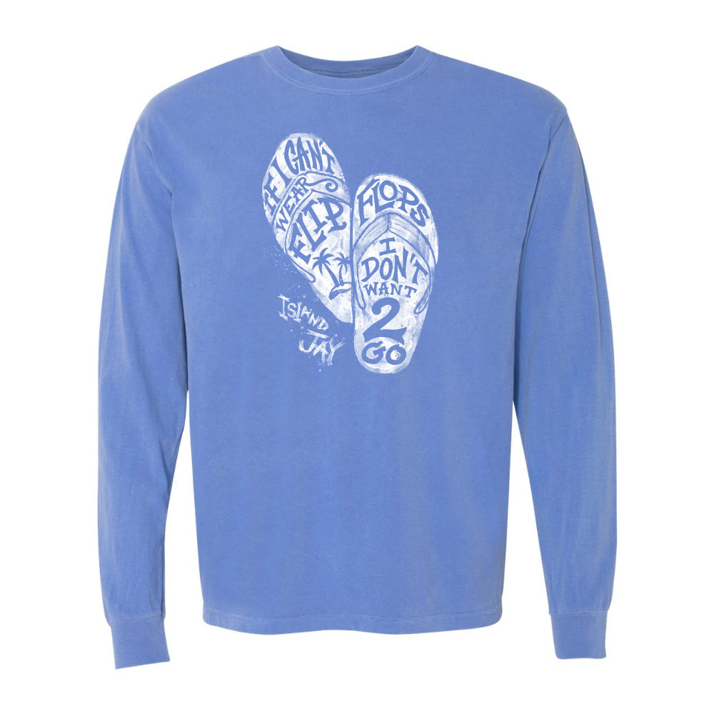 Blue long-sleeve shirt with white graphic design on a white background