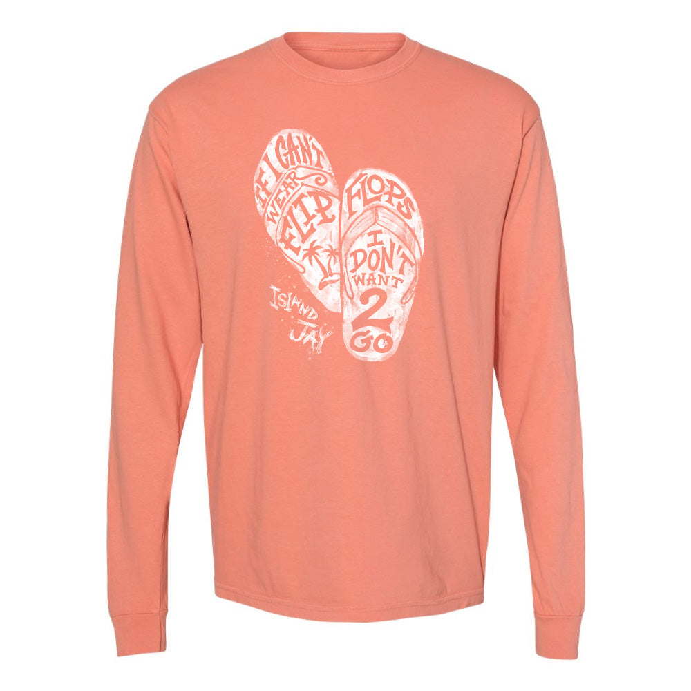 Coral long-sleeve shirt with white graphic design on a white background