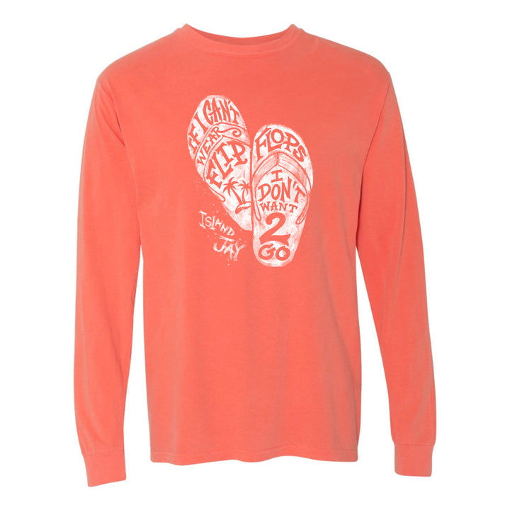 Coral long-sleeve shirt with graphic design on a white background