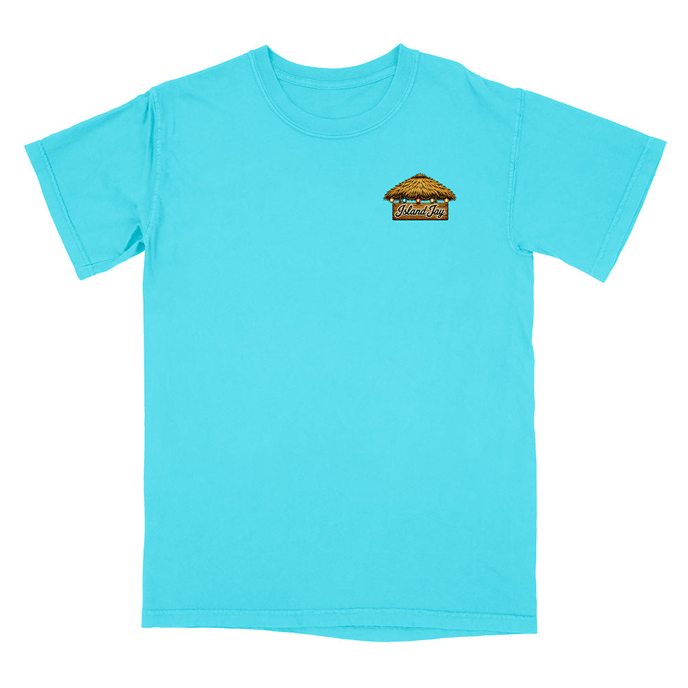 A light turquoise blue short-sleeve t-shirt with a small graphic on the left chest depicting a thatched-roof structure with the text 'WELCOME TO HILARION'.