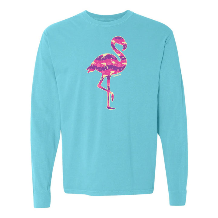 Turquoise long-sleeve shirt with a pink flamingo design on a white background