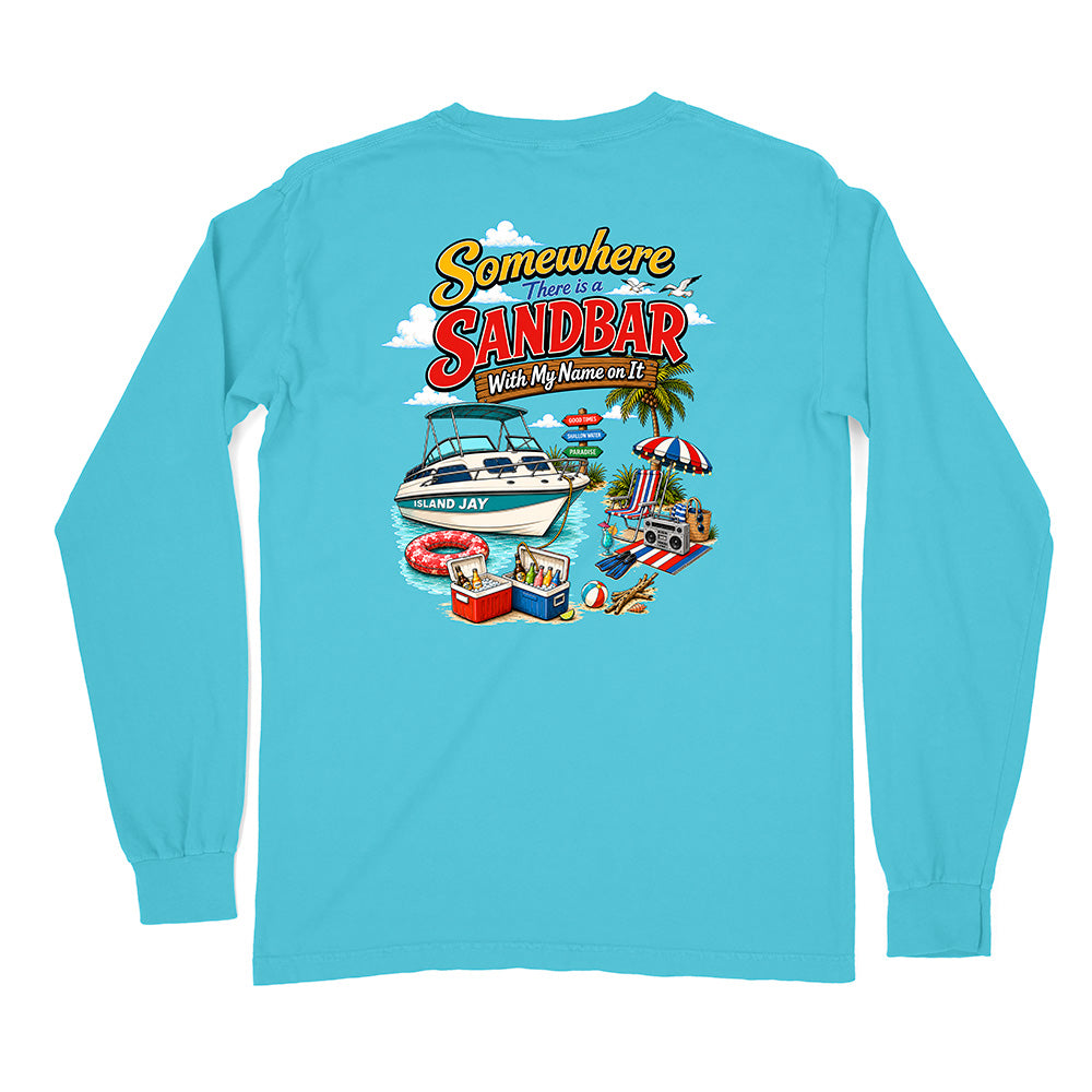 A light blue long-sleeve t-shirt with a colorful graphic print on the back featuring a speedboat, beach umbrella, towels, and the text 'Somewhere Sandbar With My Name on It'.