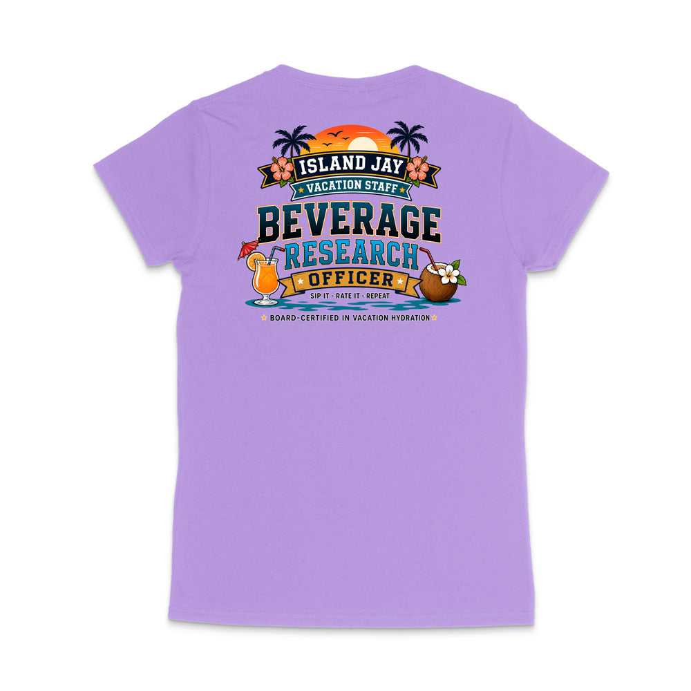 A light purple short-sleeve t-shirt shown from the back, featuring a colorful graphic print with tropical island illustrations and the text 'ISLAND JAY BEVERAGE RESEARCH OFFICER'.