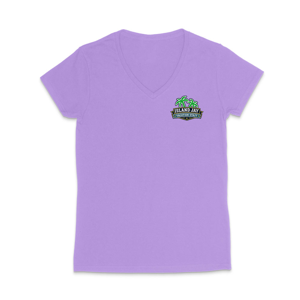 A violet women's short-sleeve V-neck t-shirt with a small colorful graphic on the left chest featuring palm trees and the text 'Island Jay Vacation Staff'.