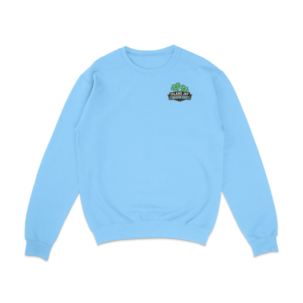 A light blue crewneck sweatshirt with a small graphic on the left chest featuring green palm trees and the text 'SUNSET BEACH'.