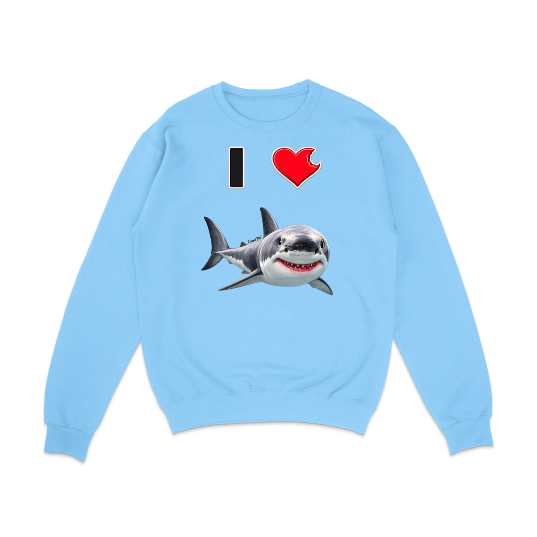 A light blue crewneck sweatshirt featuring a graphic print of a great white shark and the text 'I' followed by a red heart, displayed on a clean white background.