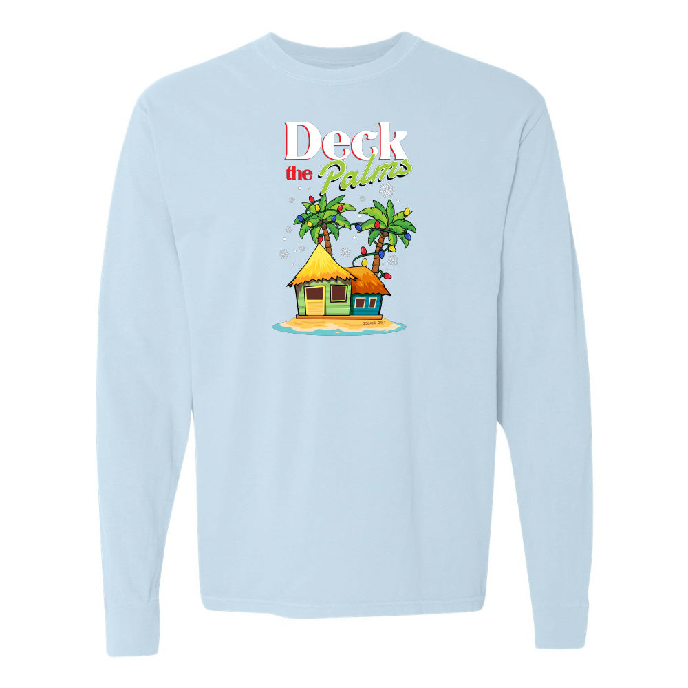 Light blue long-sleeve shirt with a tropical hut and palm tree design and graphic text reading "Deck The Palms" on a white background