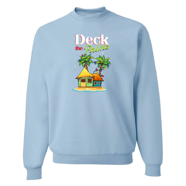 Light Blue sweatshirt with a tropical hut and palm tree design and graphic text reading "Deck The Palms" on a white background