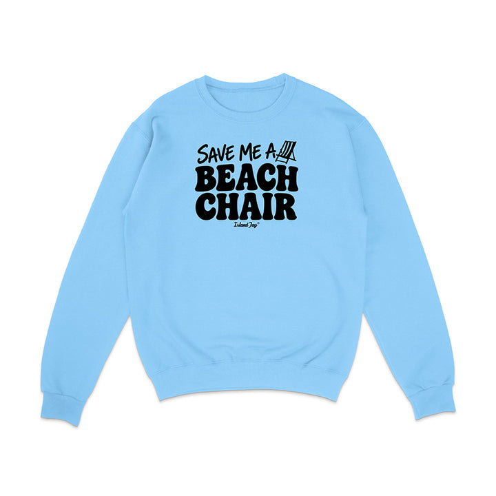 A light blue crewneck sweatshirt with a black graphic print on the chest reading 'SAVE ME A BEACH CHAIR' 