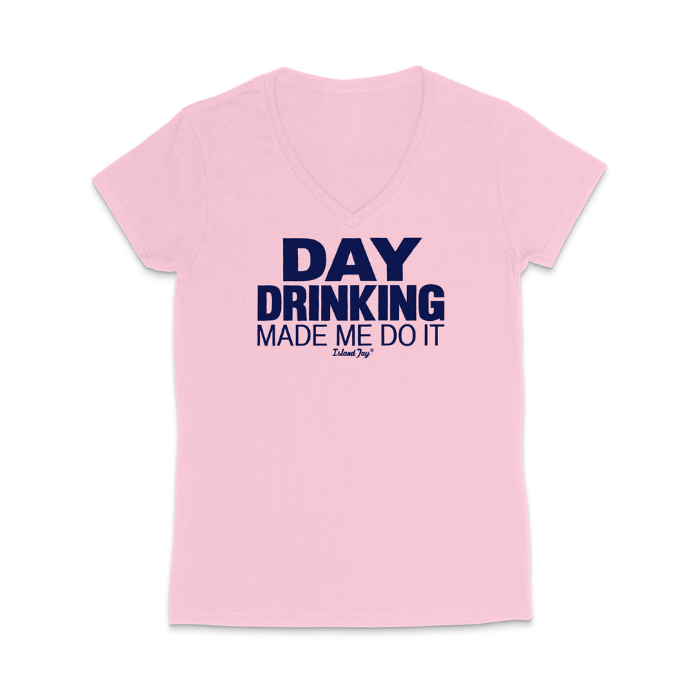 A light pink women's V-neck t-shirt with a dark navy blue graphic text print reading 'DAY DRINKING MADE ME DO IT' and a small 'Edible Zips' logo underneath, displayed on a clean white background.