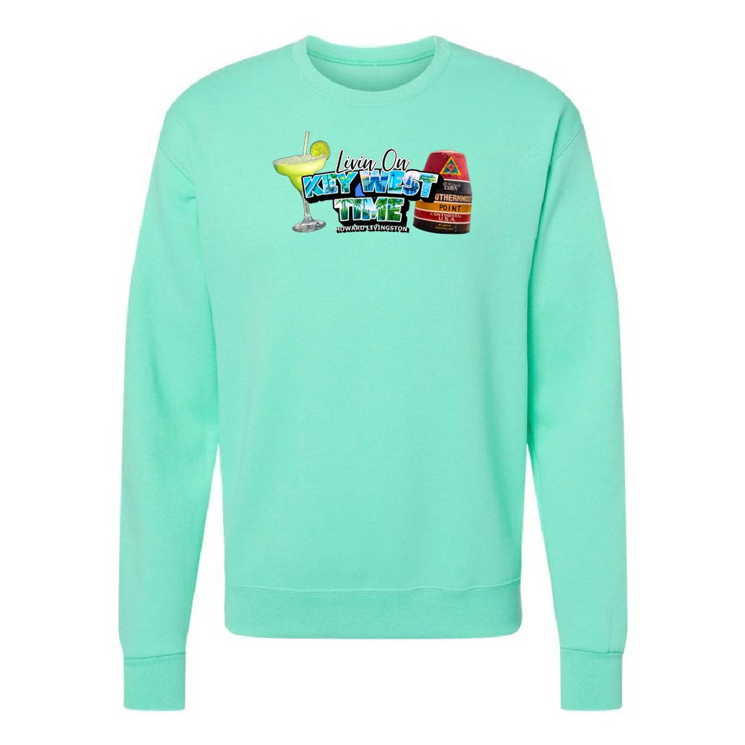 Mint green sweatshirt with colorful graphic on a white background