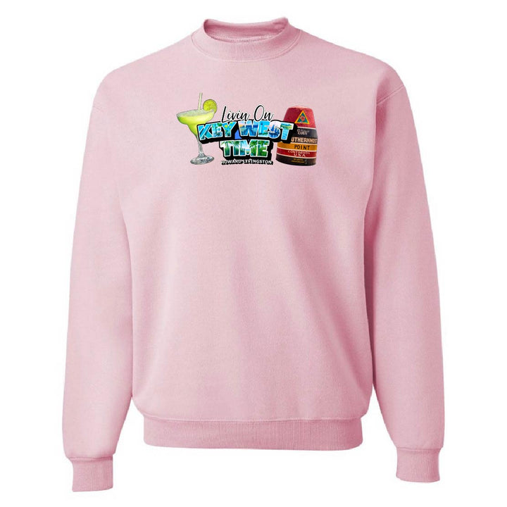 Pink sweatshirt with colorful graphic design on a white background