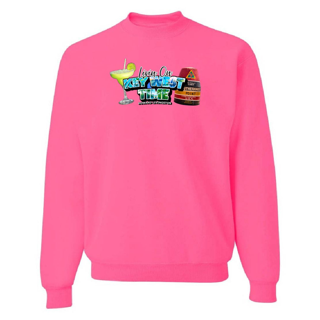 Pink sweatshirt with colorful graphic design on a white background