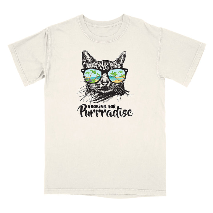 Beige t-shirt with a cat graphic and 'Looking for Purradise' text on a white background