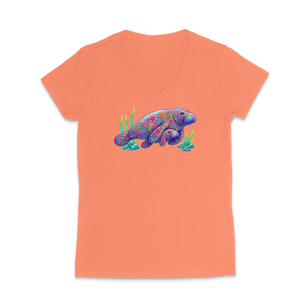 Peach-colored t-shirt with a colorful sea turtle design on a white background