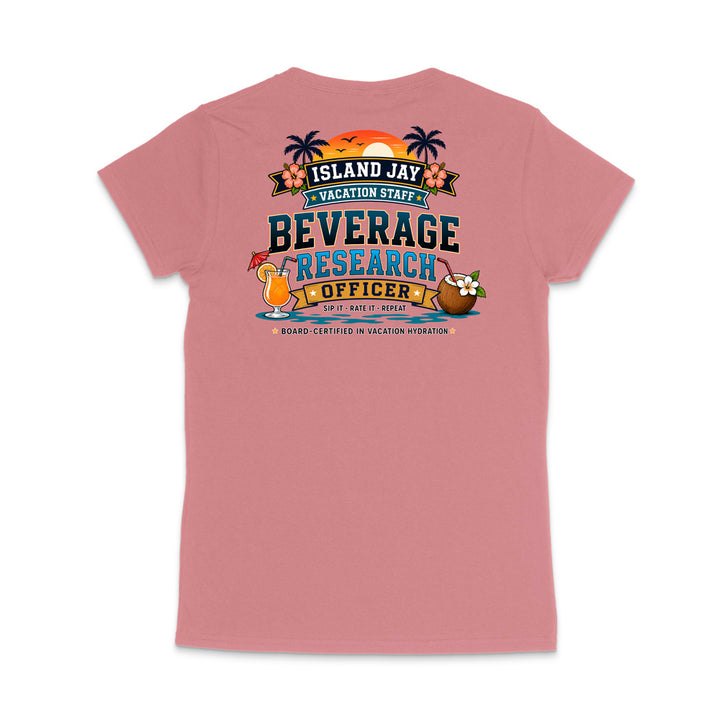 A pink short-sleeve t-shirt shown from the back, featuring a colorful graphic print with tropical elements and the text 'ISLAND JAY BEVERAGE RESEARCH OFFICER'.