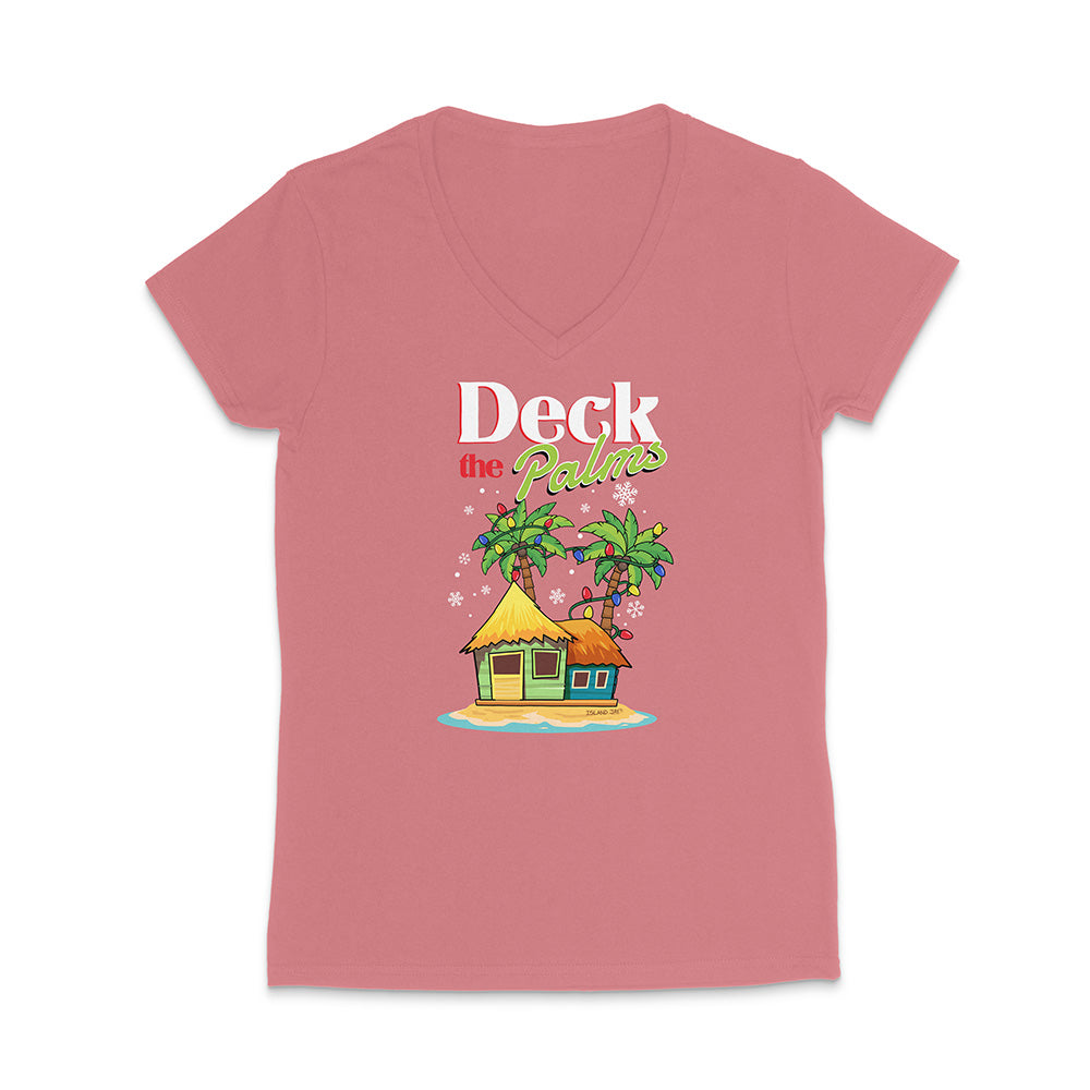 Pink t-shirt with a tropical hut and palm trees graphic and 'Deck the Palms' text on a white background.