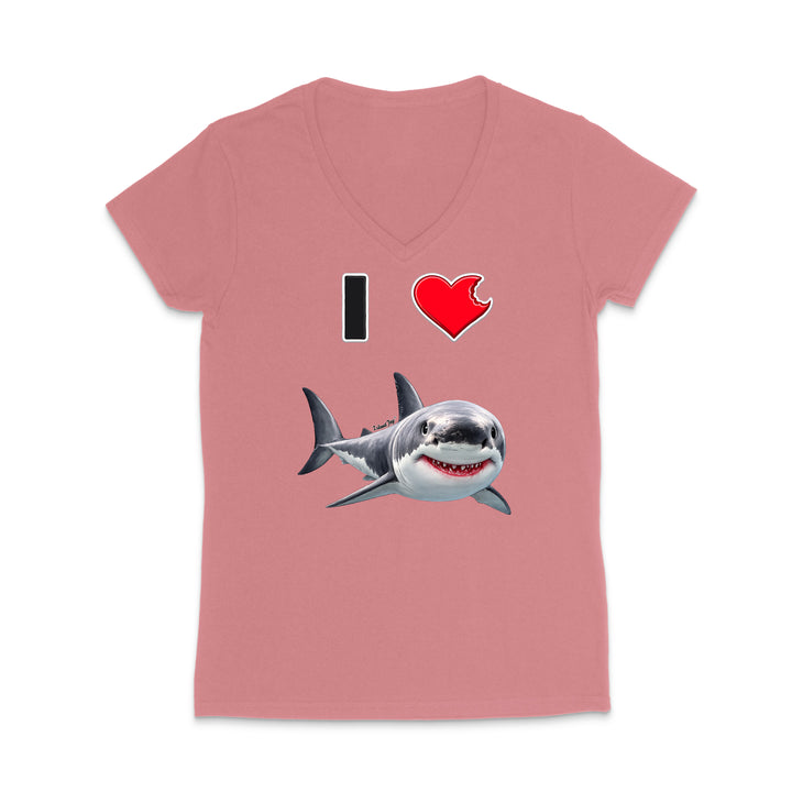 A pink women's V-neck t-shirt featuring a graphic print of a shark and the text 'I' and a heart, displayed on a clean white background.