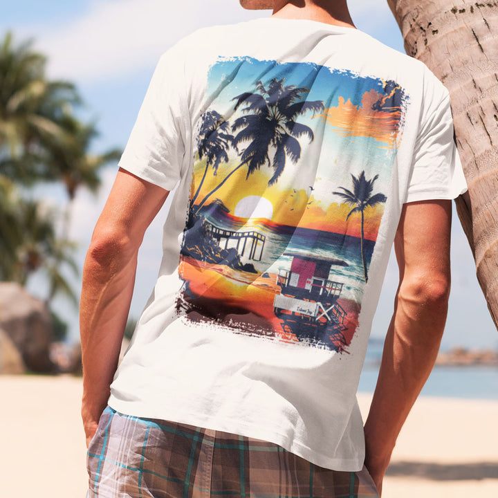 Moments of Tranquility in Paradise T-Shirt Worn by a man leaning against a palm tree