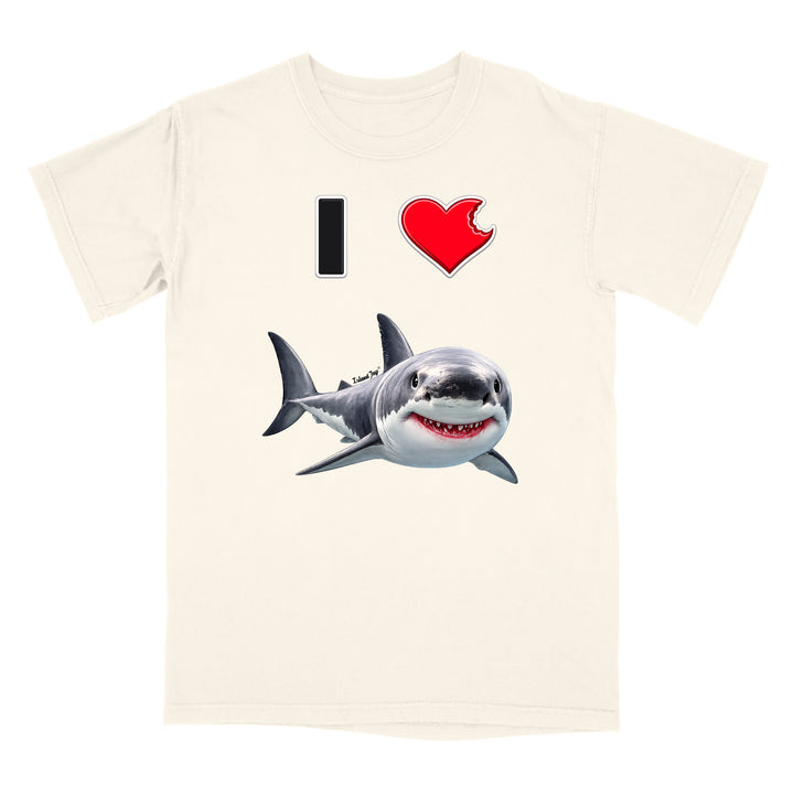 An off-white short-sleeve crewneck t-shirt featuring a graphic print of a cartoon shark and the text 'I' and 'heart' in red and black.