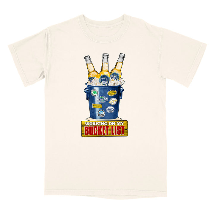 White t-shirt with a graphic of a bucket of beer and 'Working on my Bucket List' text.