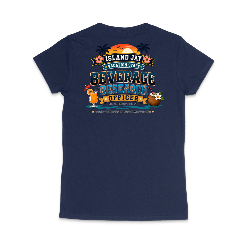 A black short-sleeve t-shirt shown from the back, featuring a colorful graphic print with tropical-themed text reading 'ISLAND JAY VACATION STAFF BEVERAGE RESEARCH OFFICER' and illustrations of a sunset, cocktail, coconut drink, and flowers.