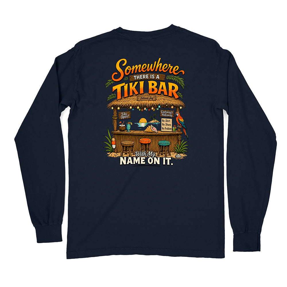 A navy blue long-sleeve t-shirt shown from the back, featuring a colorful graphic print of a tropical tiki bar with the text 'Somewhere THERE IS A TIKI BAR' and 'With My NAME ON IT.'.