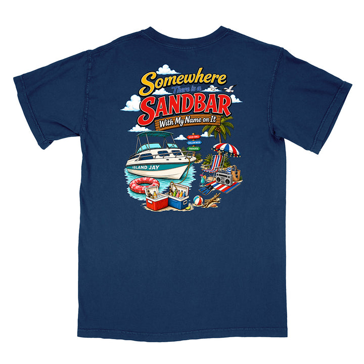 A navy blue short-sleeve t-shirt shown from the back, featuring a colorful graphic print with the text 'Somewhere in the Sandbar With My Name on It' and illustrations of a boat, beach umbrella, cooler, and beach accessories.