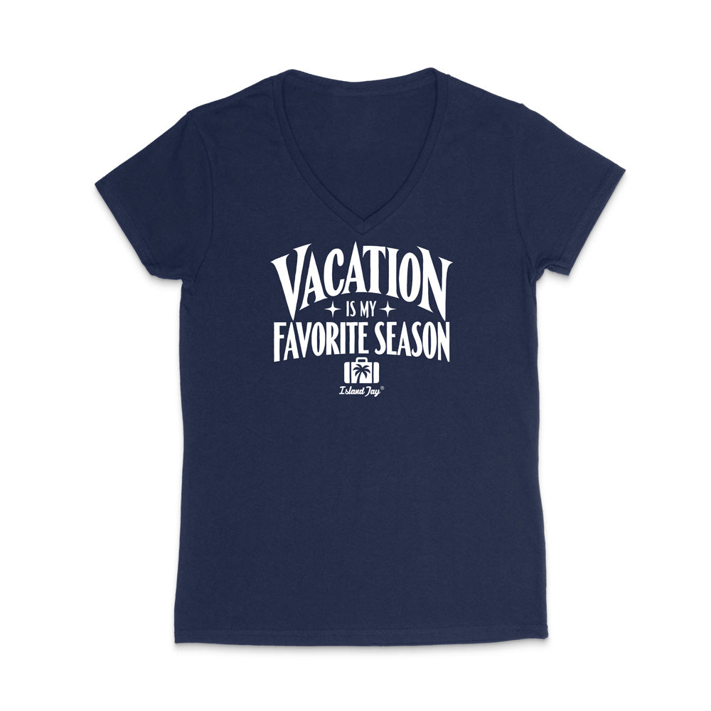 A navy blue women's V-neck t-shirt with a white graphic print on the front that reads 'VACATION IS MY FAVORITE SEASON' with a small palm tree and 'Island Trip' logo underneath, displayed on a clean white background.