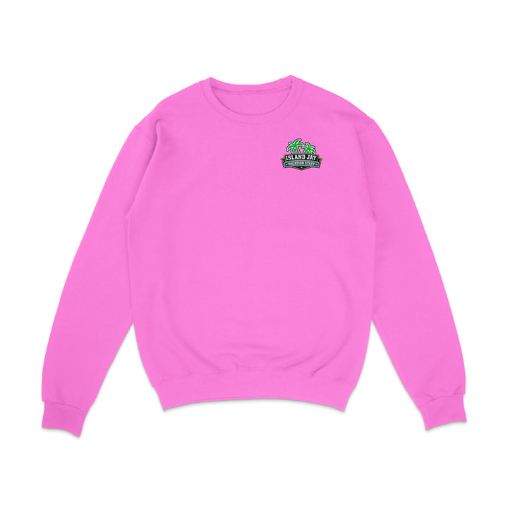A bright pink crewneck sweatshirt with a small graphic on the left chest featuring green palm trees and the text 'SUNSET BEACH'.