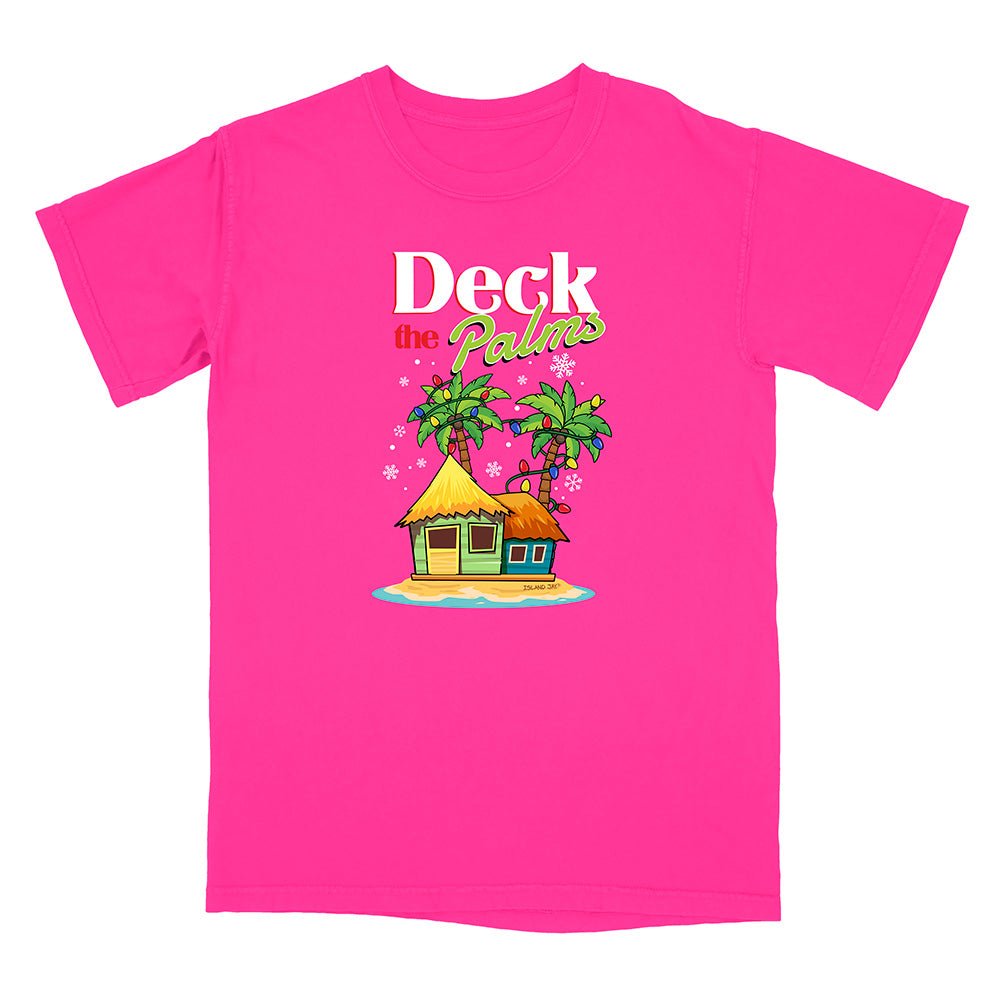 Neon Pink t-shirt with a tropical hut and palm tree design with graphic text reading "Deck The Palms" on a white 