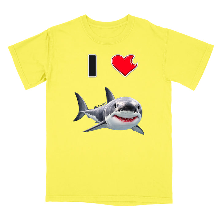 A bright yellow short-sleeve crewneck t-shirt featuring a graphic print of a great white shark and the text 'I' followed by a red heart with a bite taken out of it, on a plain white background.