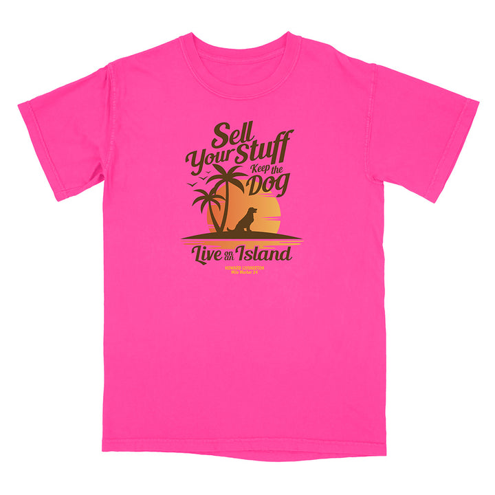 Pink t-shirt with a tropical graphic and text on a white background