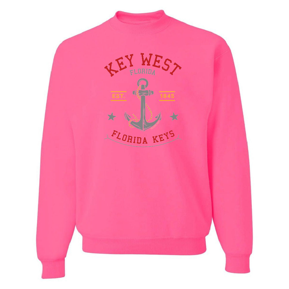 Pink sweatshirt with 'Key West Florida Keys' text and anchor graphic on a white background