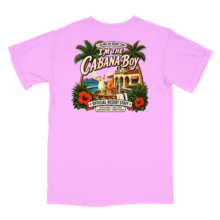 A light pink short-sleeve t-shirt shown from the back, featuring a large, colorful graphic print with palm trees, hibiscus flowers, a resort building, and the text 'I'm The Cabana Boy' and 'Official Resort Staff'.
