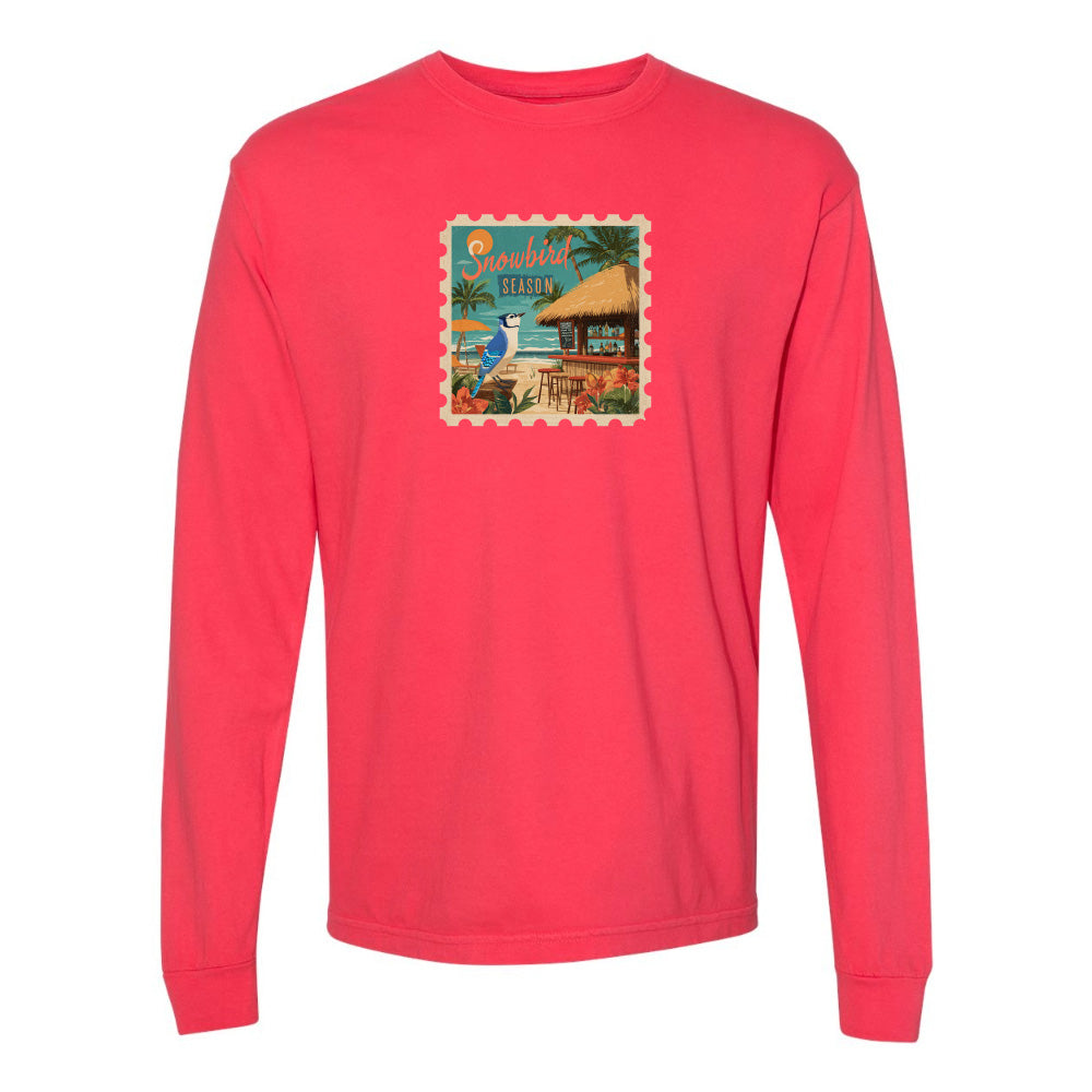 Red long-sleeve shirt with a beach-themed graphic on a white background