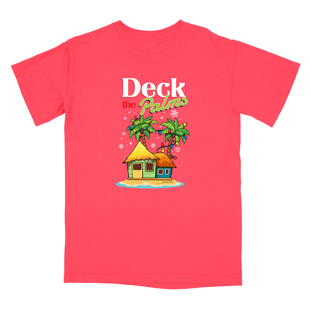 Red t-shirt with a tropical hut and palm tree design with graphic text reading "Deck The Palms" on a white 