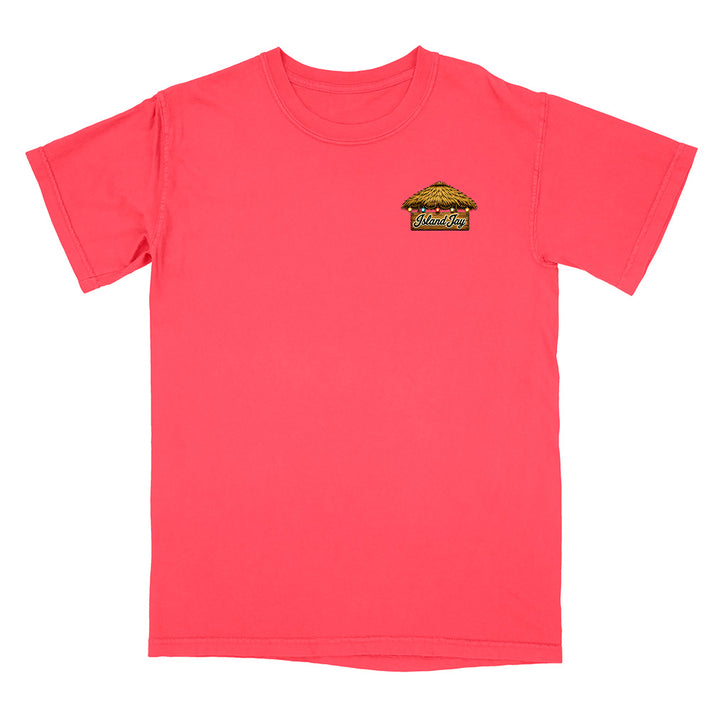A coral pink short-sleeve t-shirt with a small graphic on the left chest depicting a burger with the text 'Wicked' in a retro font, shown against a plain white background.
