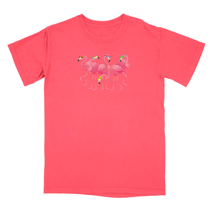 Pink t-shirt with flamingo design on a white background
