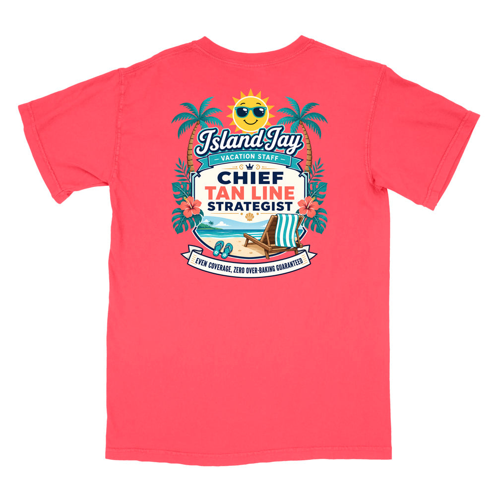 A coral short-sleeve t-shirt with a colorful graphic print on the front. The graphic features a smiling sun wearing sunglasses, palm trees, a beach scene, and text that reads 'Island Jay Vacation Staff by CHIEF TAN LINE STRATEGIST'.