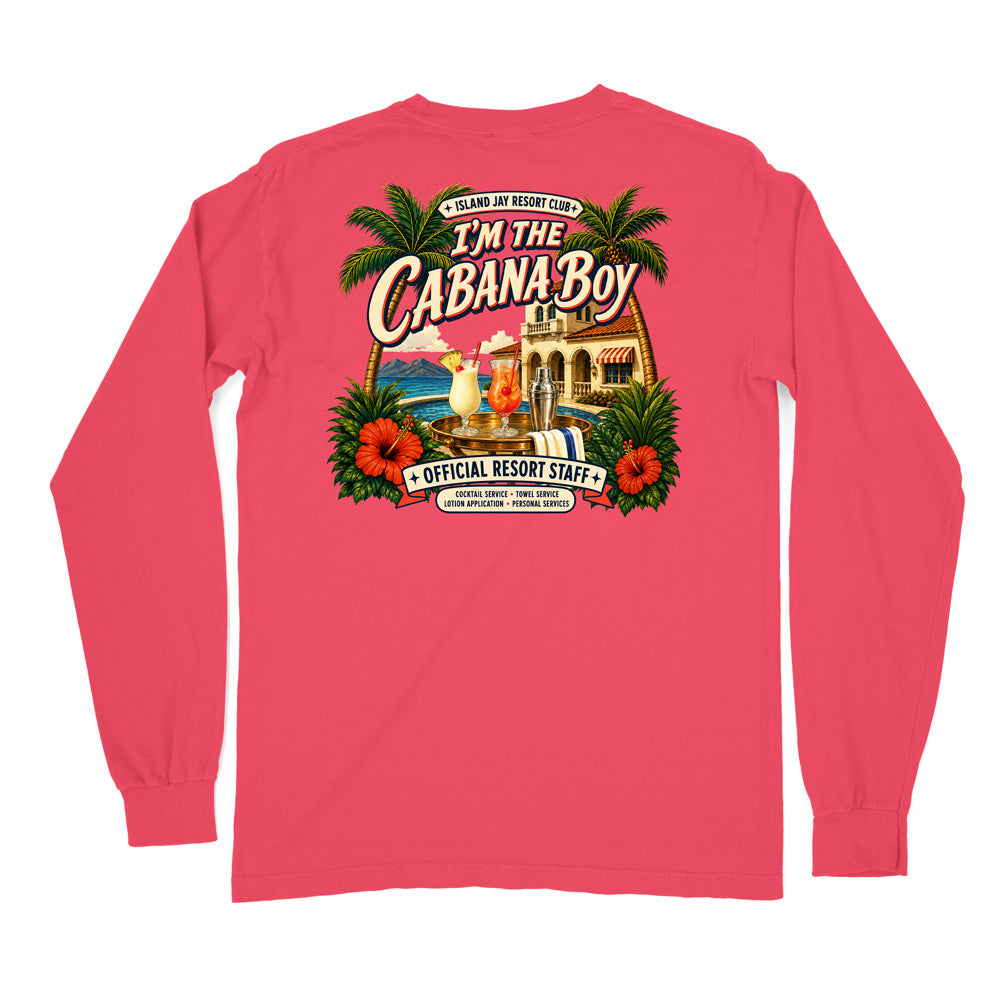 A coral pink long-sleeve t-shirt with a colorful graphic on the front. The graphic features palm trees, hibiscus flowers, a cocktail, a resort building, and text reading 'I'M THE CABANA BOY' and 'OFFICIAL RESORT STAFF'.