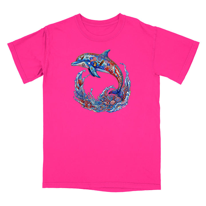Pink t-shirt with a colorful dolphin design on a white background