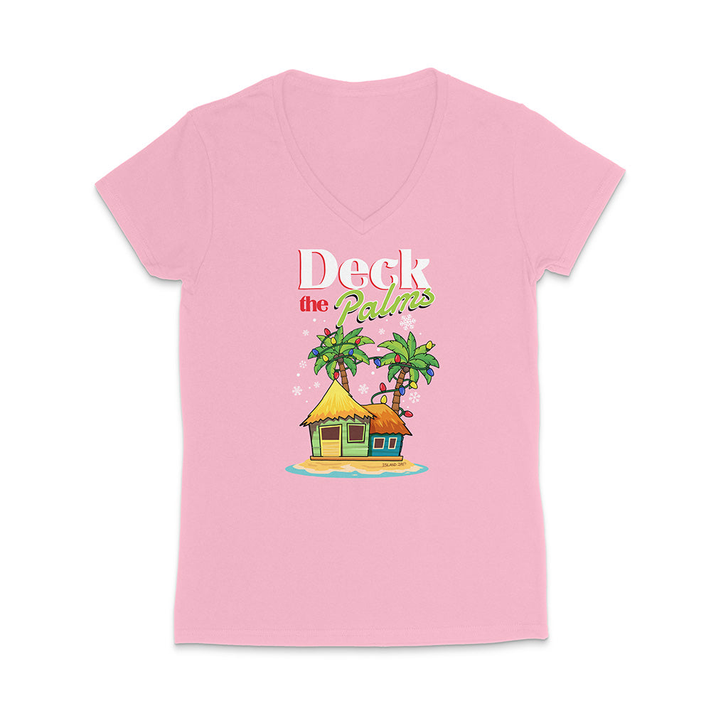 Pink t-shirt with a tropical hut and palm trees graphic and 'Deck the Palms' text on a white background.