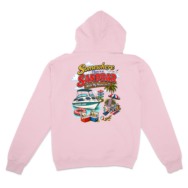 A light pink pullover hoodie shown from the back, featuring a colorful graphic print with the text 'Somewhere in the Sandbar' and beach-themed illustrations including a boat, umbrella, and lounge chairs.