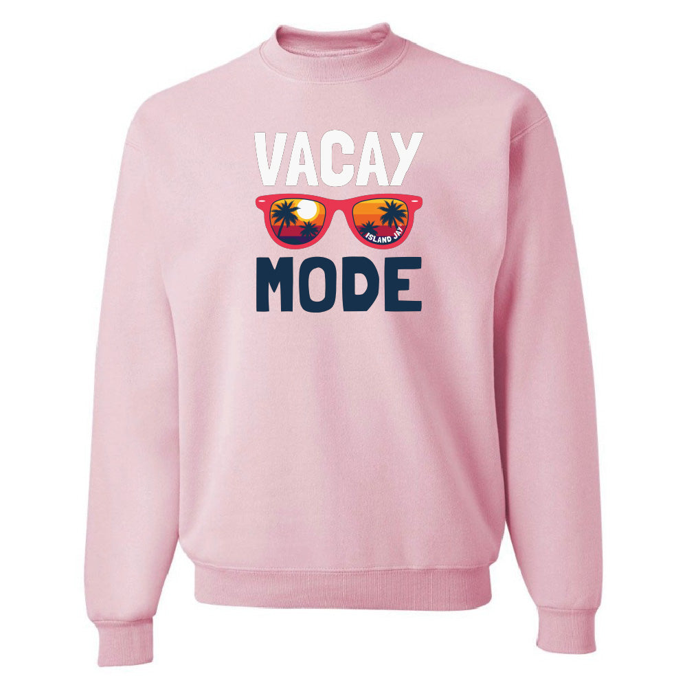 Pink sweatshirt with 'Vacay Mode' text and sunglasses graphic on a white background