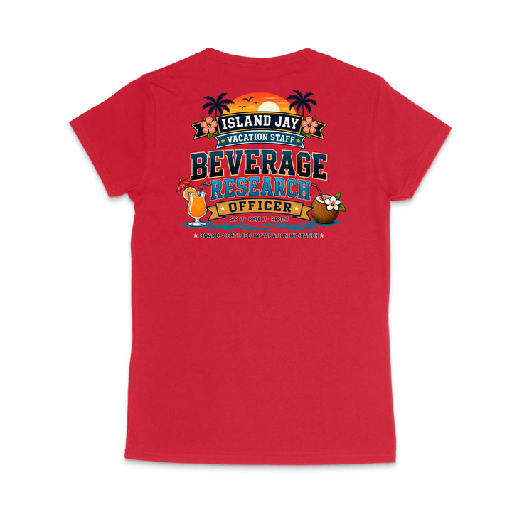A red short-sleeve t-shirt shown from the back, featuring a colorful graphic print that reads 'ISLAND JAY VACATION STAFF BEVERAGE RESEARCH OFFICER' with tropical illustrations including palm trees, a cocktail, a coconut, and a flower.