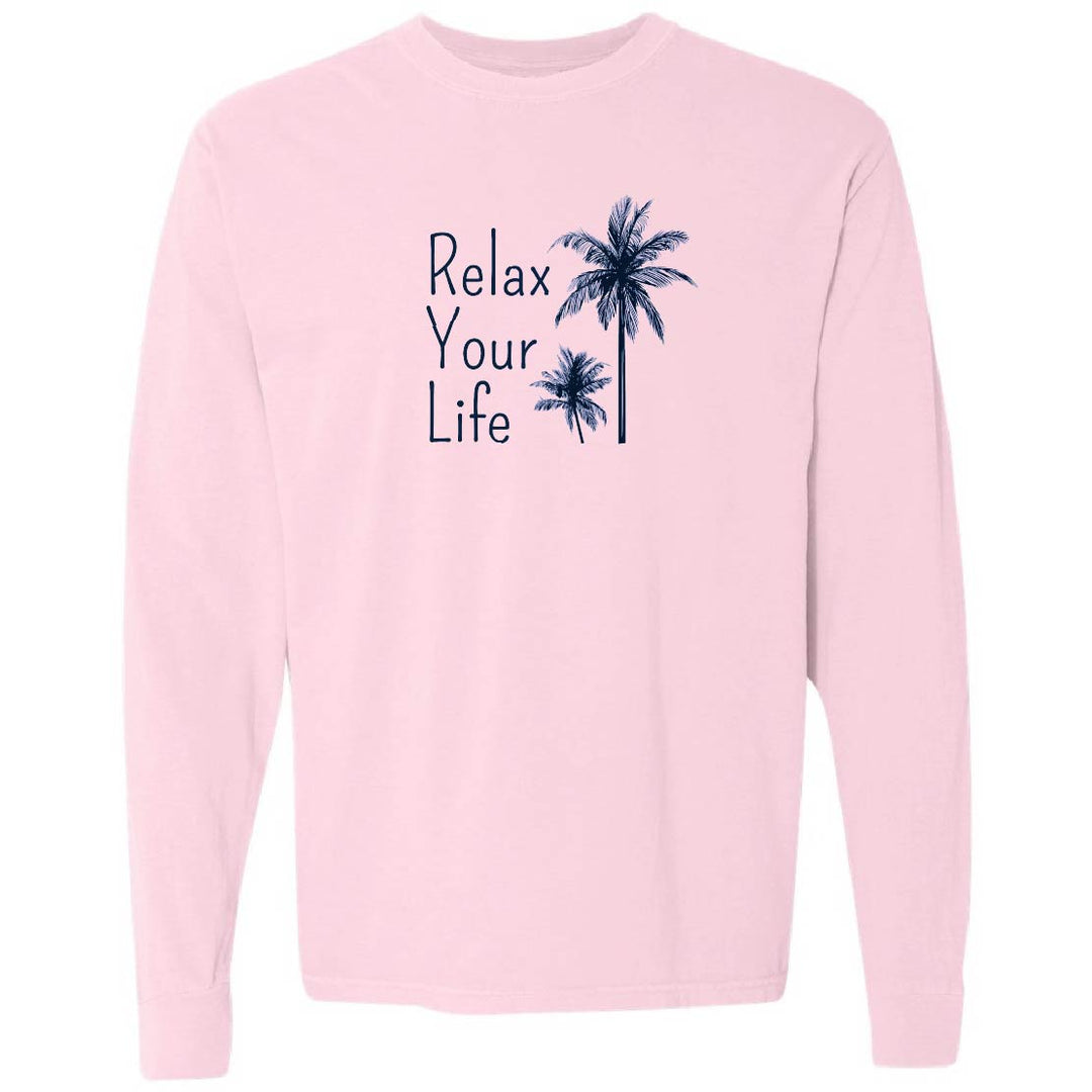 Pink sweatshirt with 'Relax Your Life' text and palm tree graphics on a white background